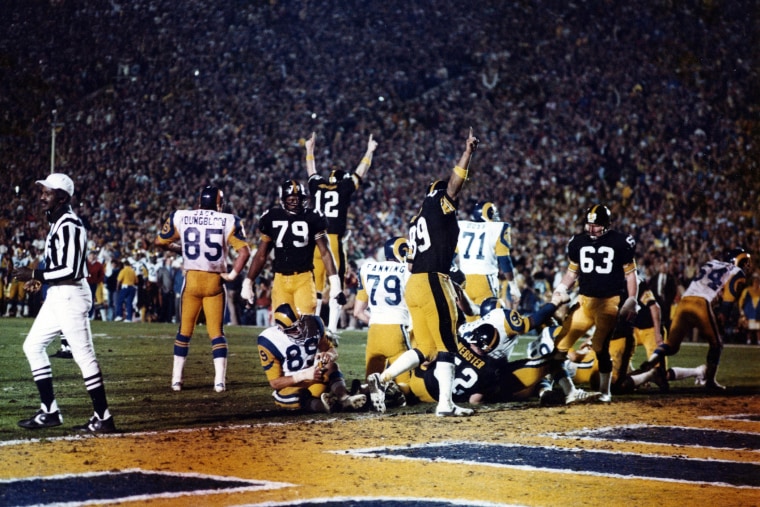 Quarterback Terry Bradshaw #12 of the Pittsburgh Steelers along with other teammates celebrate after scoring a touchdown during Super Bowl XIV against the Los Angeles Rams on Jan. 20, 1980 at the Rose Bowl in Pasadena, Calif.