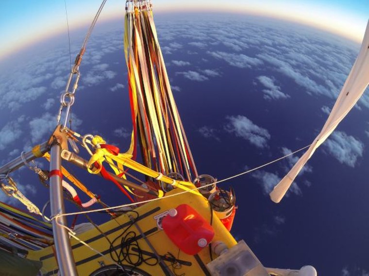 In Jan. 26, 2015 photo provided by the Two Eagles Balloon Team, Troy Bradley of New Mexico and Leonid Tiukhtyaev of Russia set off from Saga, Japan, in their quest to pilot the helium-filled balloon from Japan to North America. (Photo by Troy Bradley/AP)