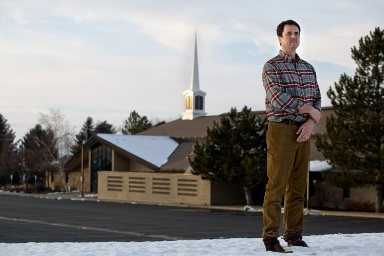 John Dehlin, outside his local ward of the Church of Jesus Christ of Latter-day Saints in Logan, Utah, Jan. 15, 2014. (Photo by Kim Raff/The New York Times/Redux)