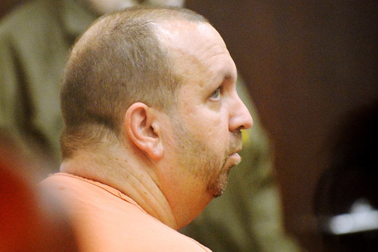 Craig Stephen Hicks, 46, sits in the Durham County courtroom for his first appearance in the shooting deaths of three University of North Carolina students on Feb. 11, 2015 in Durham, N.C. (Sara D. Davis/Getty)