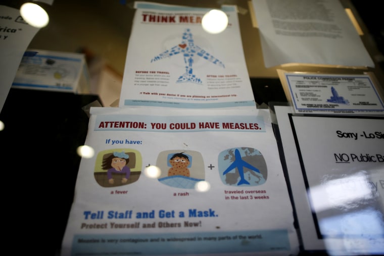 A measles poster at Venice Family Clinic in Los Angeles, Calif. Feb. 5, 2015. Lawmakers in several US states are backing proposals to make it harder for parents to opt out of school vaccinations based on personal beliefs. (Photo by Lucy Nicholson/Reuters)