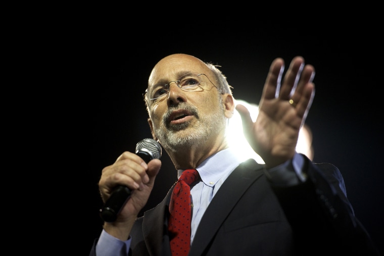 Then, Democratic candidate for Pennsylvania Governor Tom Wolf takes the stage at his primary election night party in Santander Stadium in York, Pa., May 20, 2014. (Photo by Mark Makela/Reuters)