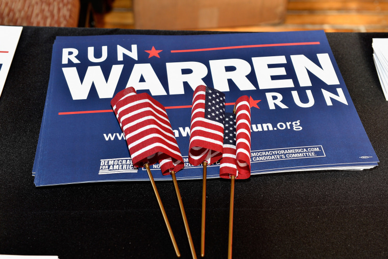 Signs and flags a \"Run Warren Run\" event on Jan. 17, 2015 in Manchester, N.H.