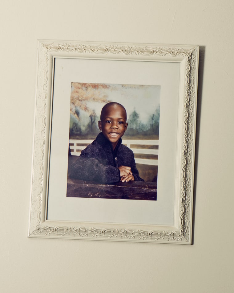 A portrait of Ramarley Graham as a young child hangs in the living room of the family home in the Bronx.