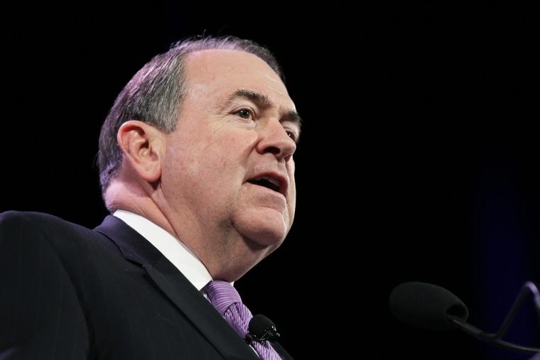 In this Saturday, Jan. 24, 2015, file photo, former Arkansas Gov. Mike Huckabee speaks during the Freedom Summit, in Des Moines, Iowa. (Photo by Charlie Neibergall/AP)