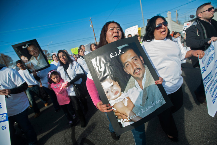 Marchers carry posters of Antonio Zambrano-Montes during a protest over the police killing on Tuesday of the Mexican-born apple picker, in Pasco, Wash., Feb. 14, 2015. (Photo by Rajah Bose/The New York Times/Redux)