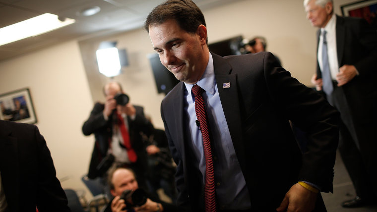 Wisconsin Governor Scott Walker departs after speaking at the American Action Forum on Jan. 30, 2015 in Washington, DC. (Photo by Win McNamee/Getty)