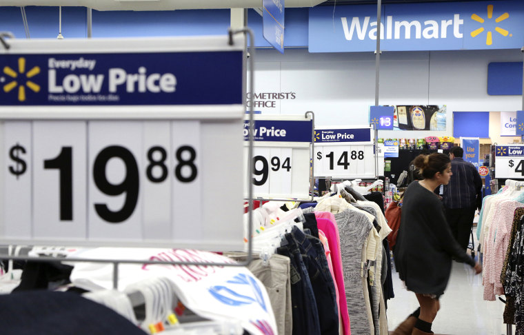 A woman shops at Walmart as the store prepares for Black Friday in Los Angeles, Calif. Nov. 24, 2014. (Photo by Jonathan Alcorn/Reuters)