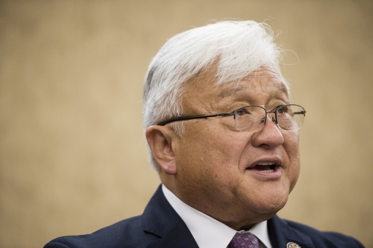 Rep. Mike Honda, D-Calif., holds a news conference with Vietnam veterans and their families to introduce the \"Toxic Exposure Research and Family Support Act of 2014\" on June 10, 2014. (Photo By Bill Clark/CQ Roll Call via AP)