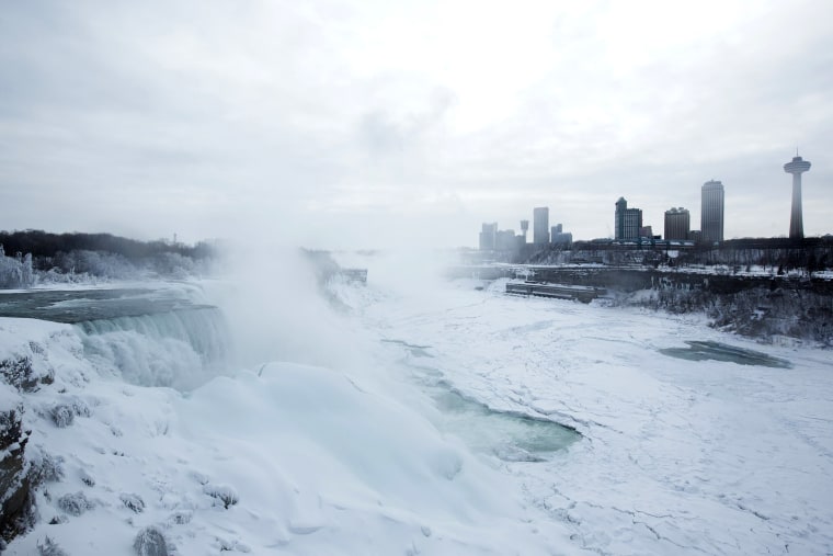 A snow-covered landscape is seen over the frozen Niagara Falls in Niagara Falls, N.Y. on Feb. 17, 2015.