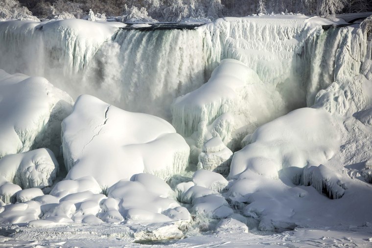 A partially frozen American Falls in sub freezing temperatures is seen in Niagara Falls, Ontario on Feb. 17, 2015.