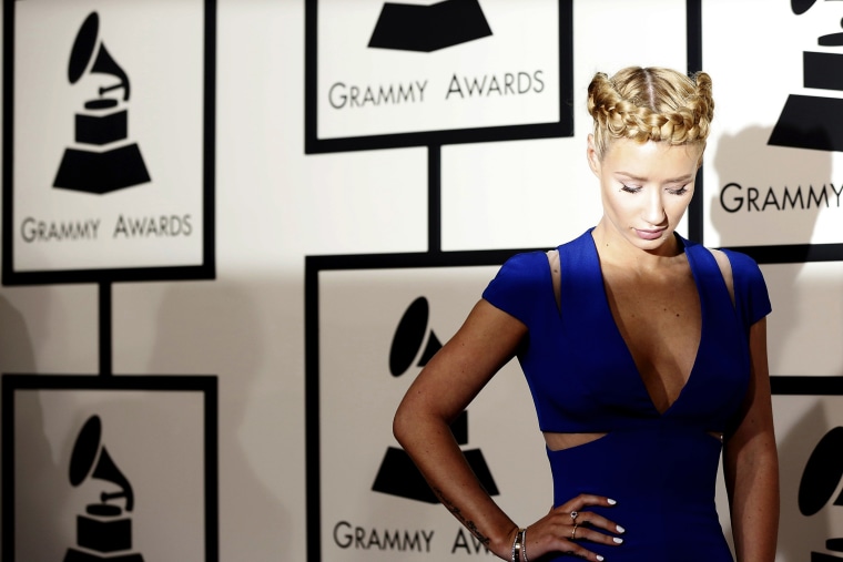 Rapper Iggy Azalea arrives at the 57th annual Grammy Awards in Los Angeles, Calif. on Feb. 8, 2015.