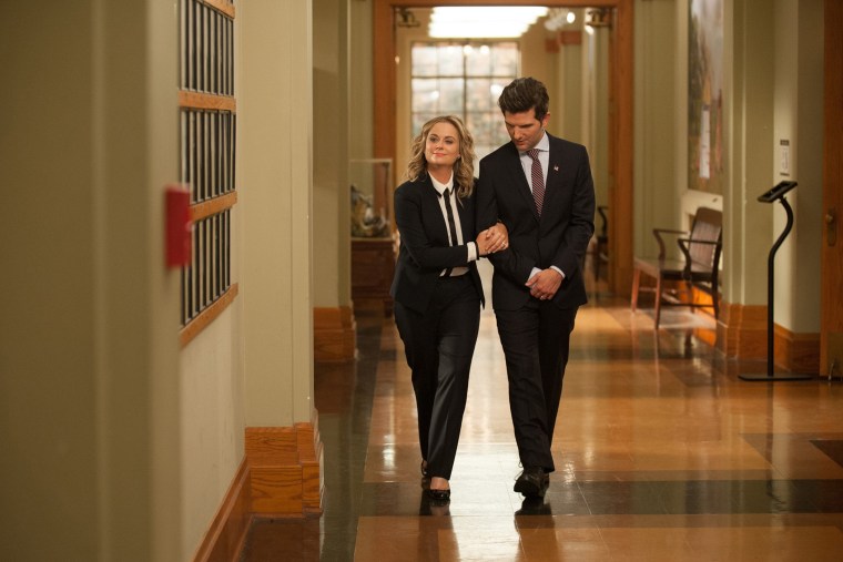Amy Poehler and Adam Scott in the Season finale of NBC's \"Parks and Recreation.\" (Photo by Colleen Hayes/NBC/NBCU Photo Bank/Getty)