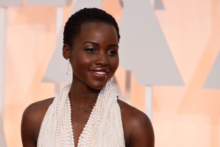 Actress Lupita Nyong'o arrives on the red carpet for the 87th Oscars Feb. 22, 2015 in Hollywood, Calif.