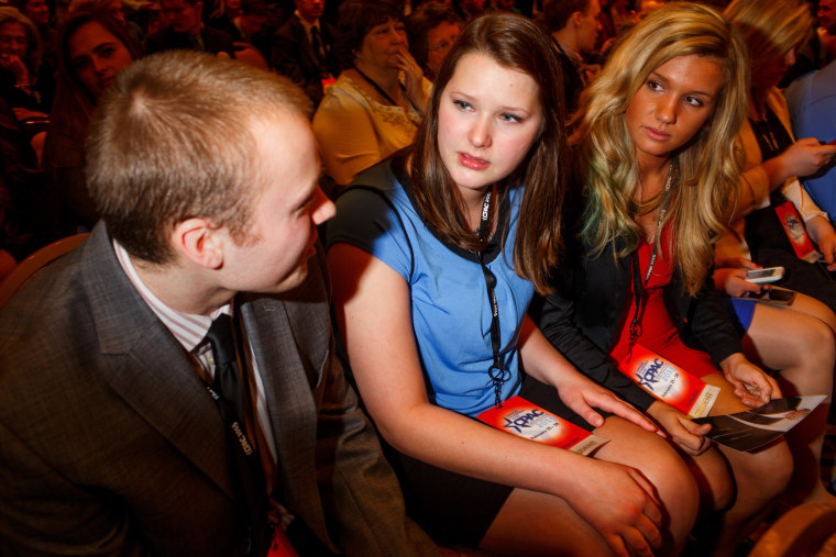 From left, Jeff Ford, Erin Moore and Mary Foster of Ferris State University talk to each other while they wait for Donald Trump to speak at CPAC in National Harbor, Md., on Feb. 27, 2015. (Photo by Melissa Golden/Redux for MSNBC)