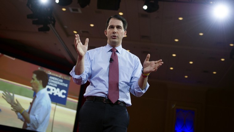 Wisconsin Gov. Scott Walker gestures while speaking during the Conservative Political Action Conference (CPAC) in National Harbor, Md., on Feb. 26, 2015. (Photo by Cliff Owen/AP)