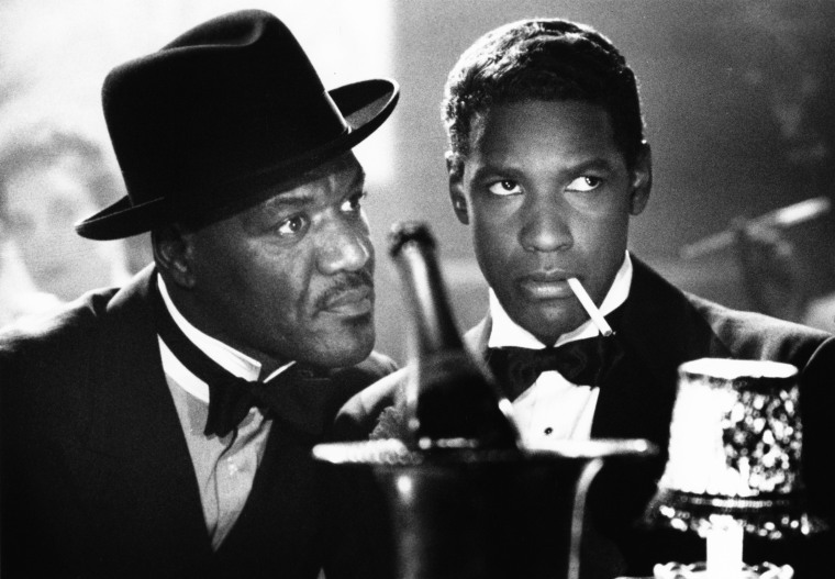 Publicity portrait of American actors Delroy Lindo and Denzel Washington in Spike's Lee's film 'Malcolm X' (Warner Brothers), 1992. (Photo by John D. Kisch/Separate Cinema Archive/Getty)
