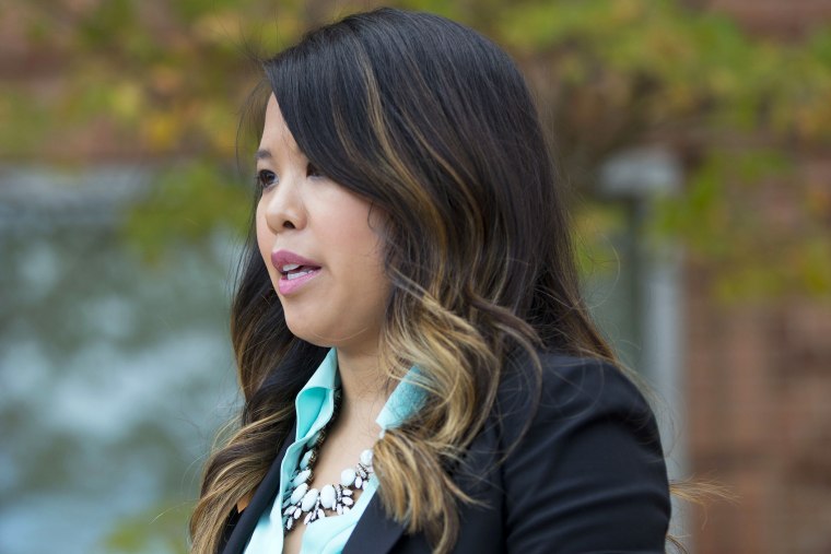 Nina Pham speaks outside of National Institutes of Health (NIH) in Bethesda, Md., Oct. 24, 2014. (Photo by Pablo Martinez Monsivais/AP)