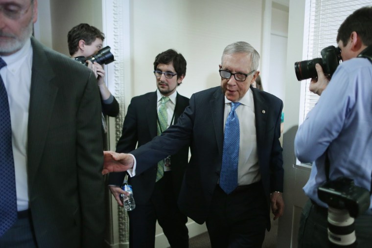 Senate Minority Leader Harry Reid (D-NV) leaves a news conference in the Radio Television Gallery at the U.S. Capitol on Feb. 26, 2015 in Washington, DC. (Photo by Chip Somodevilla/Getty)