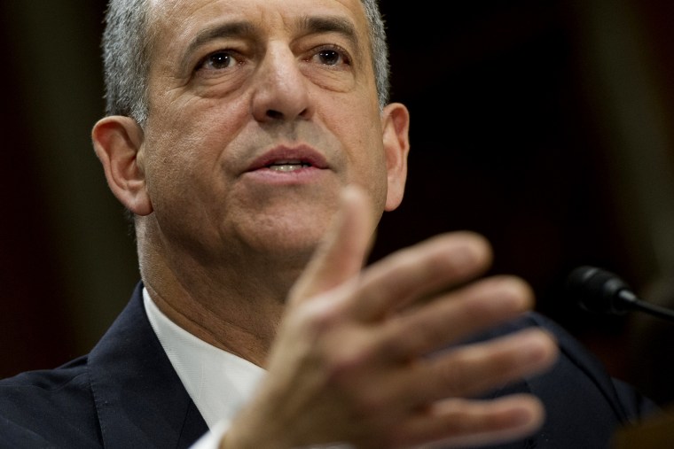 Former US Senator Russell Feingold testifies during a hearing on Capitol Hill, on Feb. 26, 2014. (Photo by Saul Loeb/AFP/Getty)