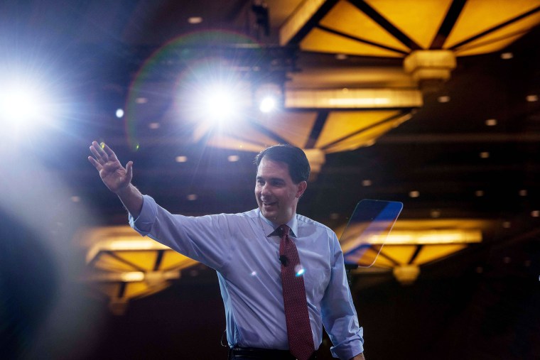 Wisconsin Governor Scott Walker walks off stage after speaking at the annual Conservative Political Action Conference (CPAC) at National Harbor, Maryland, outside Washington, on Feb. 26, 2015