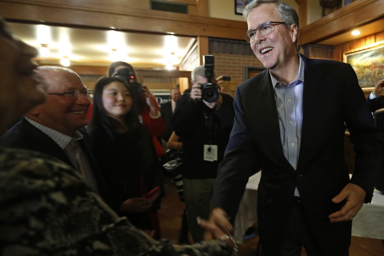 Former Governor of Florida Jeb Bush greets attendees at a fundraiser for U.S. Rep. David Young (R-IA) in Urbandale, Iowa on March 6, 2015.