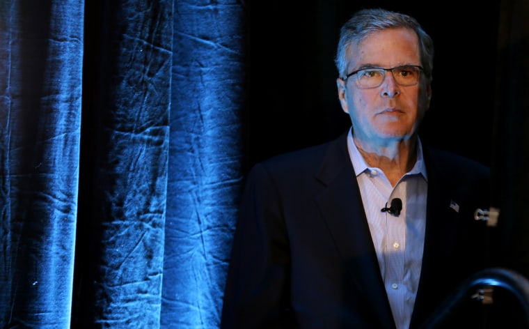 Former Florida Gov. Jeb Bush waits backstage before speaking at the Iowa Agriculture Summit, March 7, 2015, in Des Moines, Ia. (Photo by Charlie Neibergall/AP)