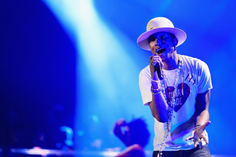 Singer Pharrell Williams performs onstage during KIIS FM's Jingle Ball 2014 powered by LINE at Staples Center on Dec. 5, 2014 in Los Angeles, Calif. (Photo by Christopher Polk/Getty Images for iHeartMedia)