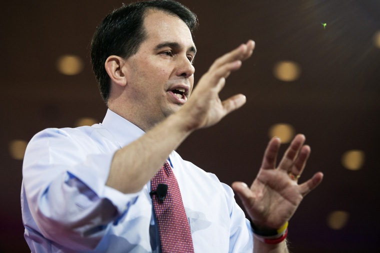 Wisconsin Gov. Scott Walker gestures while speaking during the Conservative Political Action Conference (CPAC) in National Harbor, Md. on Feb. 26, 2015. (Photo by Cliff Owen/AP)