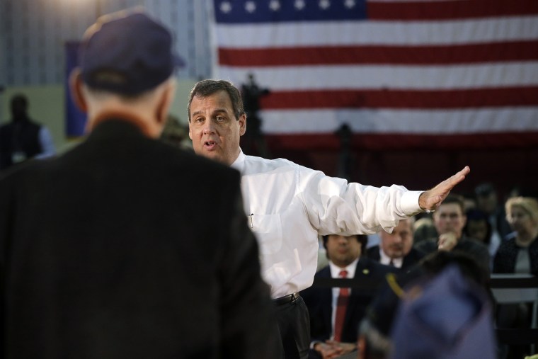 New Jersey Gov. Chris Christie answers a question from Dr. Eugene Yuliano during a town hall meeting Tuesday, March 10, 2015, in Somerville, N.J.