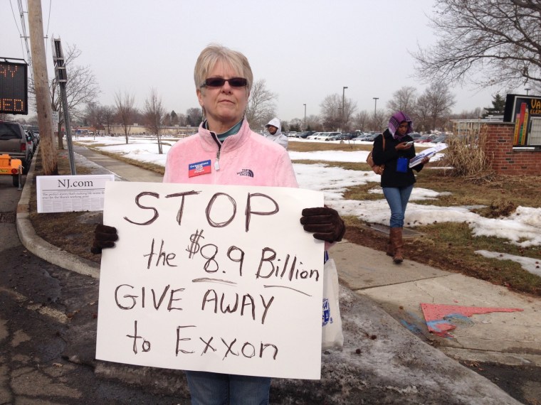Carol Gay, demonstrating outside of Tuesday's town hall in Somerville, N.J.
