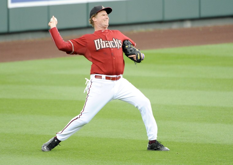 Will Ferrell plays left field for the Arizona Diamondbacks in the seventh inning against the Cincinnati Reds during a spring training baseball game on March 12, 2015.