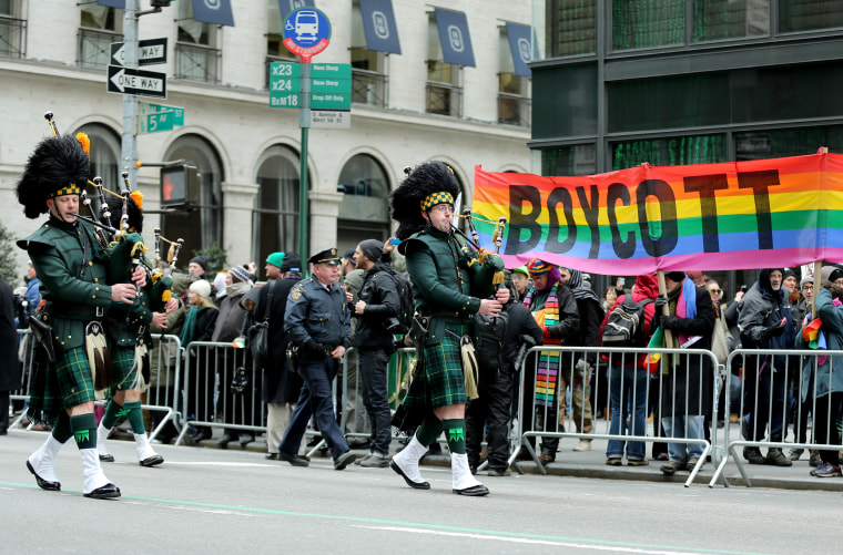 Thousands of people attend the 253rd annual St. Patrick's Day Parade along Fifth Avenue in New York City on March 17, 2014. Members of LGBT protest against the exclusion of their community from the parade. (Photo by Bilgin Sasmaz/Anadolu Agency/Getty)