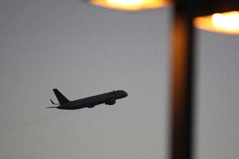 A United Airlines jet takes off. (Photo by David McNew/Getty)