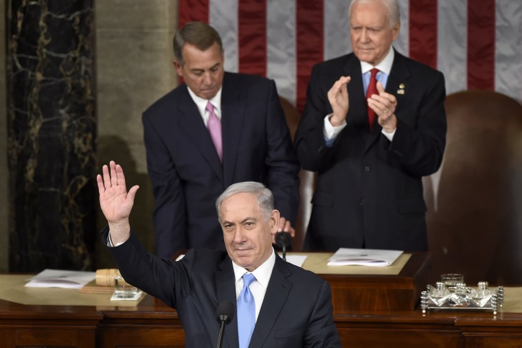 Israeli Prime Minister Benjamin Netanyahu waves as he speaks before a joint meeting of Congress on Capitol Hill in Washington on March 3, 2015. (Photo by Susan Walsh/AP)