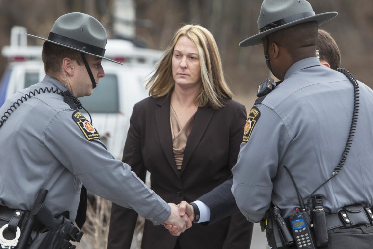 Hummelstown, Pa., Police officer Lisa Mearkle walks into District Judge Lowell A. Witmer's office in West Hanover Twp., March 24, 2015. (Photo by Mark Pynes/PennLive.com/AP)