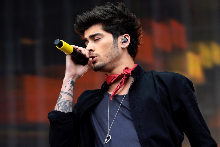 Zayn Malik of One Direction performs on stage on May 24, 2014 in Glasgow. (Photo by Mark Runnacles/PA Wire/AP)