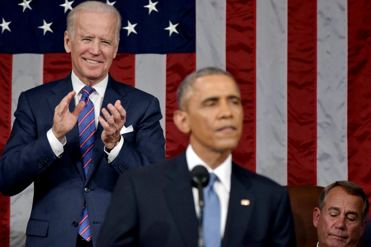 Vice President Joe Biden applauds as President Barack Obama delivers the State of the Union address before a joint session of Congress on Jan. 20, 2015 at the US Capitol in Washington, DC.