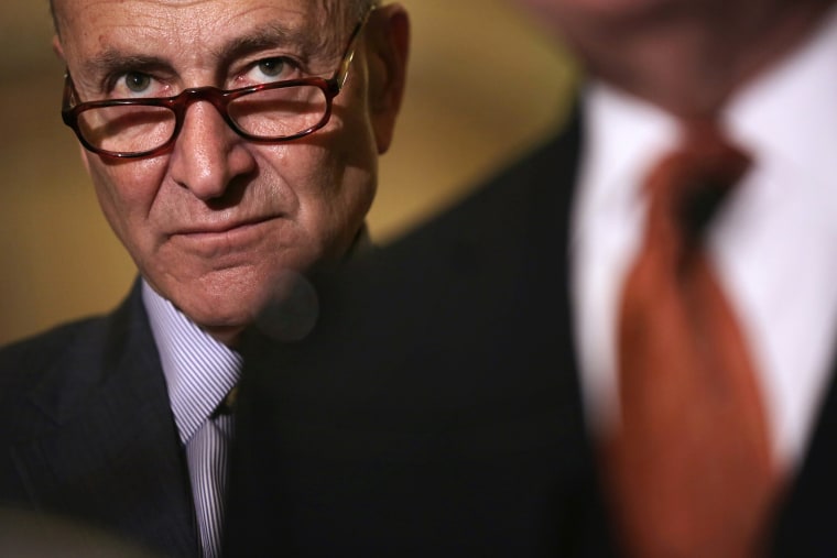 Sen. Charles Schumer (D-NY) listens during a news briefing after the weekly Democratic Policy Luncheon March 24, 2015 at the U.S. Capitol in Washington, D.C. (Photo by Alex Wong/Getty)