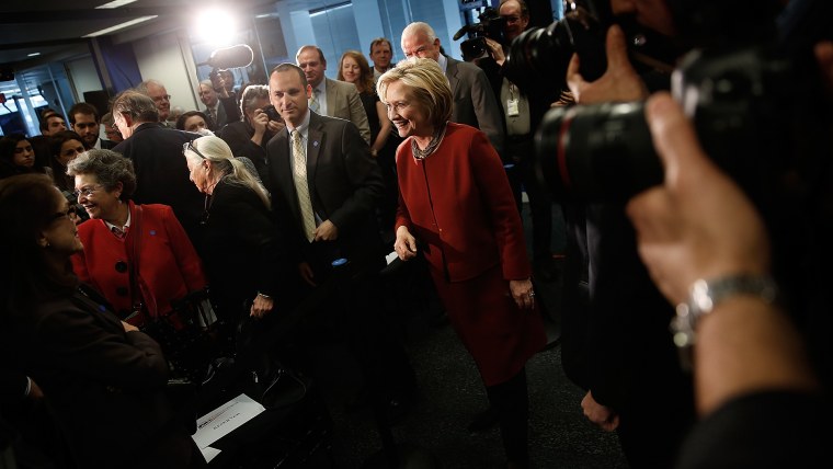 Former U.S. Secretary of State Hillary Clinton greets members of the audience after speaking at the Center for American Progress March 23, 2015 in Washington, DC. (Photo by Win McNamee/Getty)