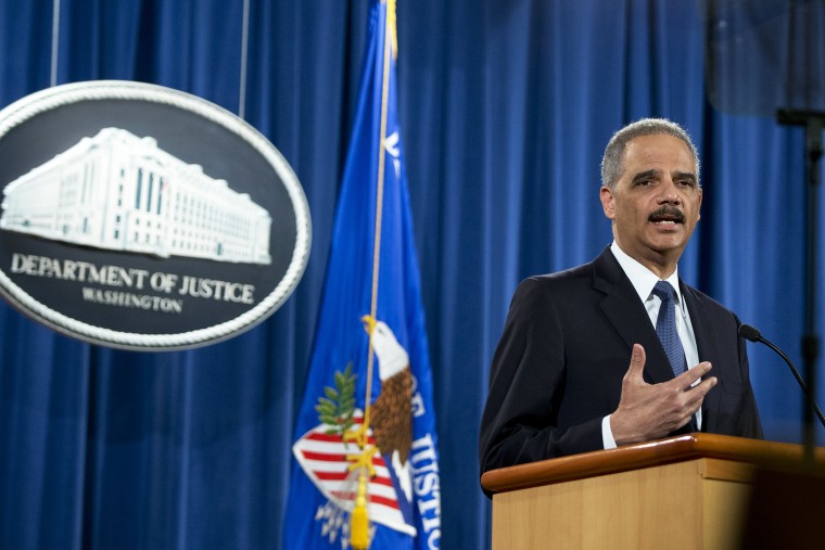 Attorney General Eric Holder speaks at the Justice Department in Washington, D.C., March 4, 2015. (Photo by Carolyn Kaster/AP)