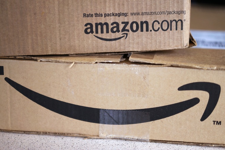 Two freshly delivered Amazon boxes are seen. (Photo by Rick Wilking/Reuters)