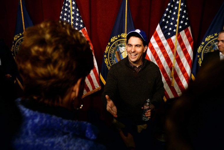 \Wisconsin Governor Scott Walker shakes hands with people following a grassroots training and rally event at Concord High School March 14, 2015 in Concord, N.H. (Photo by Darren McCollester/Getty)