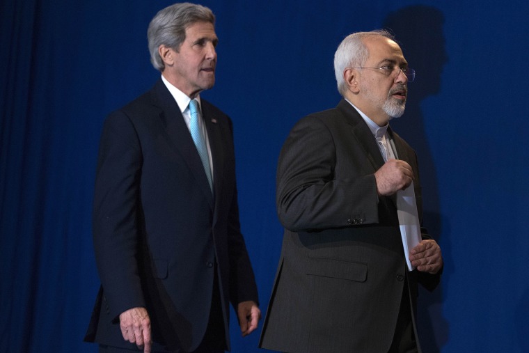 US Secretary of State John Kerry, left, and Iranian Foreign Minister Javad Zarif arrive to deliver a statement, at the Swiss Federal Institute of Technology, on Lausanne, Switzerland on April 2, 2015.