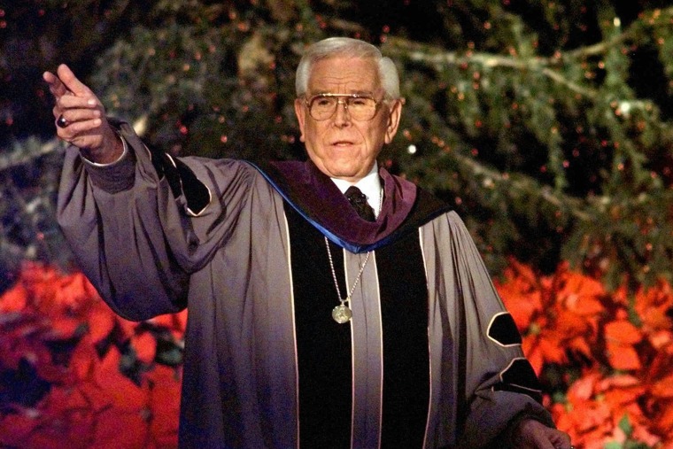 In this Dec. 24, 1997, file photo, Rev. Robert H. Schuller delivers one of seven candlelight Christmas Eve services from the Crystal Cathedral pulpit in Garden Grove, Calif.