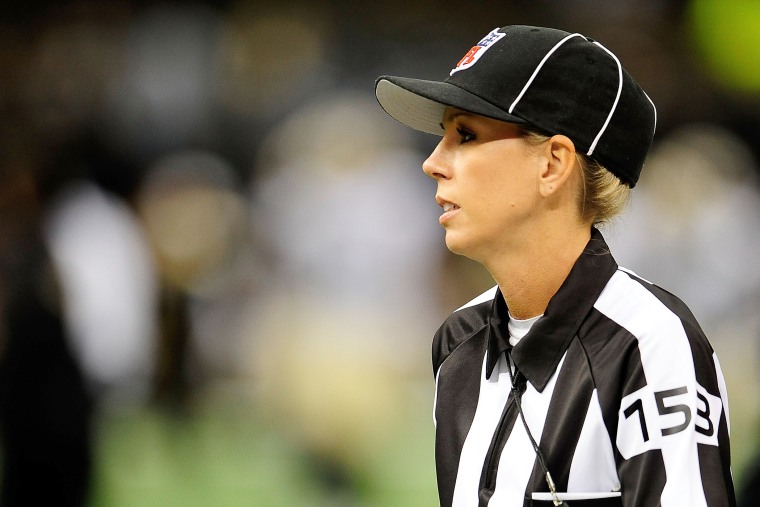 Line judge Sarah Thomas takes the field for a preseason game between the Oakland Raiders and the New Orleans Saints at the Mercedes-Benz Superdome on Aug. 16, 2013 in New Orleans, La. (Photo by Stacy Revere/Getty)