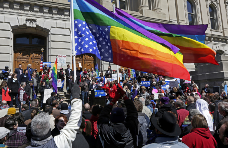 Demonstrators gather at Monument Circle to protest a controversial religious freedom bill recently signed by Governor Mike Pence, during a rally in Indianapolis March 28, 2015. (Photo by Nate Chute/Reuters)