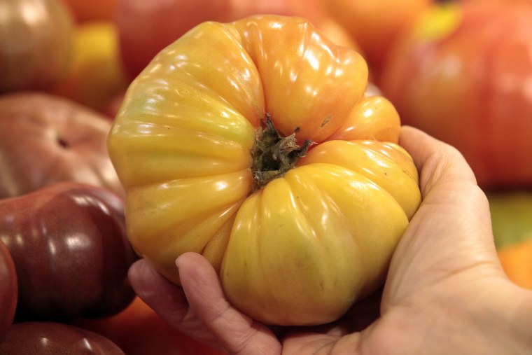 An organically grown Heirloom tomato is seen in the produce section at the Whole Foods grocery story in Ann Arbor, Mich. on March 8, 2012.