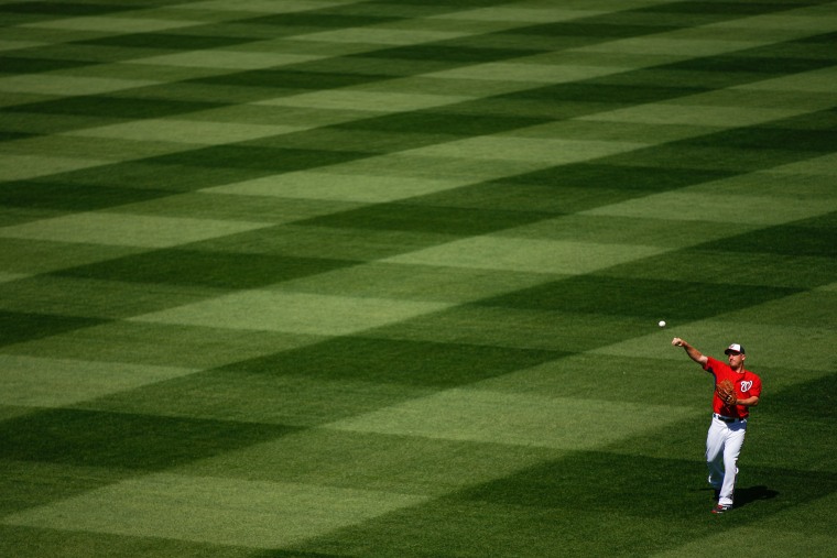 Washington Nationals pitcher Jordan Zimmermann warms up before a baseball game between the Nationals and the New York Mets on opening day at Nationals Park, April 6, 2015, in Washington, D.C. (Andrew Harnik/AP)