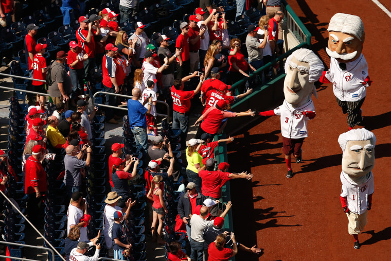 Nationals presidents mascots greets fans before a baseball game between the Washington Nationals and the New York Mets on opening day at at Nationals Park, April 6, 2015, in Washington, D.C. (Andrew Harnik/AP)
